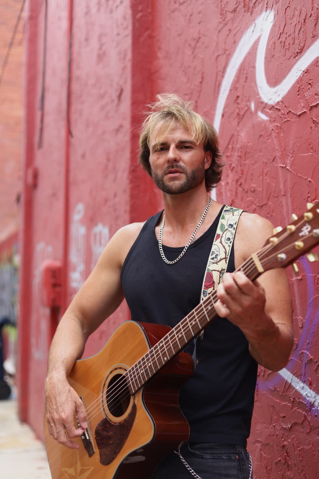 Aaron · with guitar